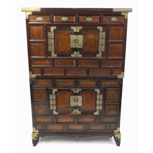 20 - Oriental balsa wood side cupboard, fitted with four drawers above two pairs of cupboard doors, 137cm... 