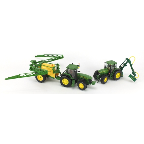 2088 - Two John Deere die cast tractors, Schucho Britain's and Ertle