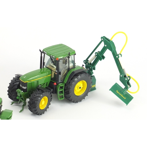 2088 - Two John Deere die cast tractors, Schucho Britain's and Ertle