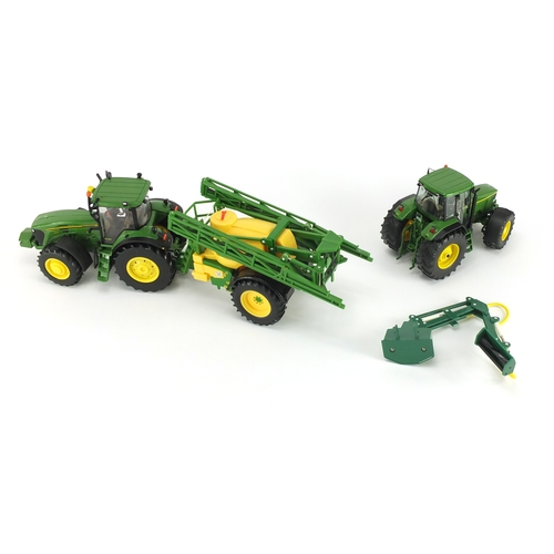 2088 - Two John Deere die cast tractors, Schucho Britain's and Ertle