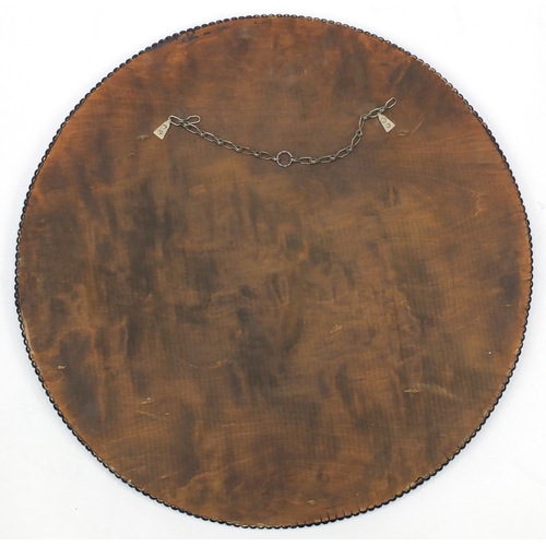 2040 - Bohemian red flashed circular mirror, with bevelled plate, 67.5cm in diameter