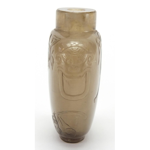 684 - Chinese rock crystal snuff bottle carved with animalia handles and three bats, 5.5cm high