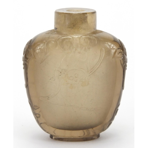 684 - Chinese rock crystal snuff bottle carved with animalia handles and three bats, 5.5cm high