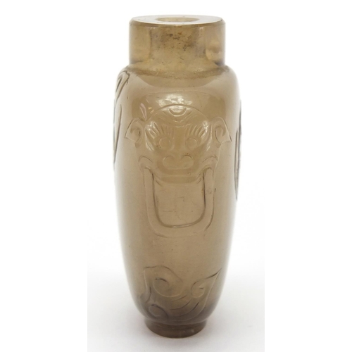 684 - Chinese rock crystal snuff bottle carved with animalia handles and three bats, 5.5cm high