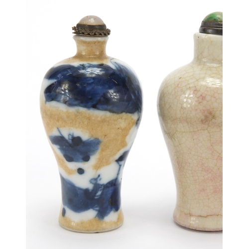 692 - Three Chinese porcelain and stoneware snuff bottles with stoppers of Meiping form, two hand painted ... 