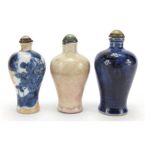 692 - Three Chinese porcelain and stoneware snuff bottles with stoppers of Meiping form, two hand painted ... 