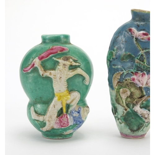 691 - Three Chinese porcelain turquoise ground snuff bottles, comprising two relief examples and one hand ... 