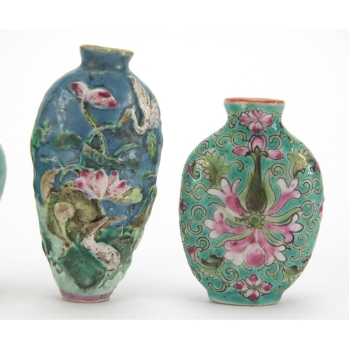 691 - Three Chinese porcelain turquoise ground snuff bottles, comprising two relief examples and one hand ... 