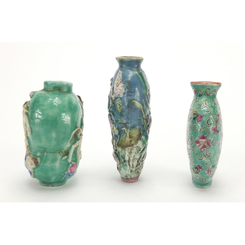 691 - Three Chinese porcelain turquoise ground snuff bottles, comprising two relief examples and one hand ... 