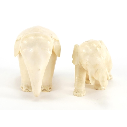 716 - Two carved ivory elephants including a Japanese example with character marks to the base of one foot... 