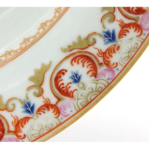 579 - Chinese export porcelain plate, hand painted in the famille rose palette with a central panel of fig... 