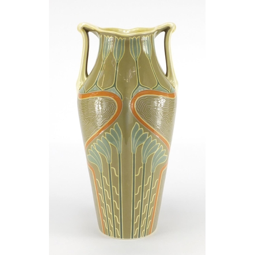 1002 - Continental Art Nouveau pottery vase with twin handles, hand painted and incised with stylised flowe... 