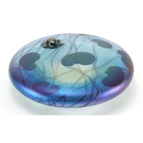 913 - Glasform iridescent glass lily pad paperweight mounted with a silver frog by John Ditchfield, etched... 