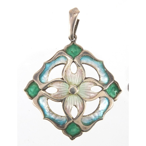 1041 - Two Art Nouveau silver brooches including an enamelled flower head example, both with indistinct mak... 