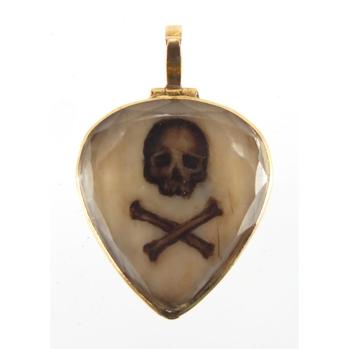 1045 - 17th/18th century Stuart Crystal Mori locket, the ivory panels engraved with skull and crossbones an... 