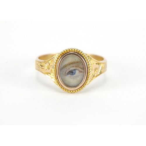 1080 - Antique 9ct gold lovers eye ring, the ivory panel hand painted with an eye, indistinct Chester hallm... 