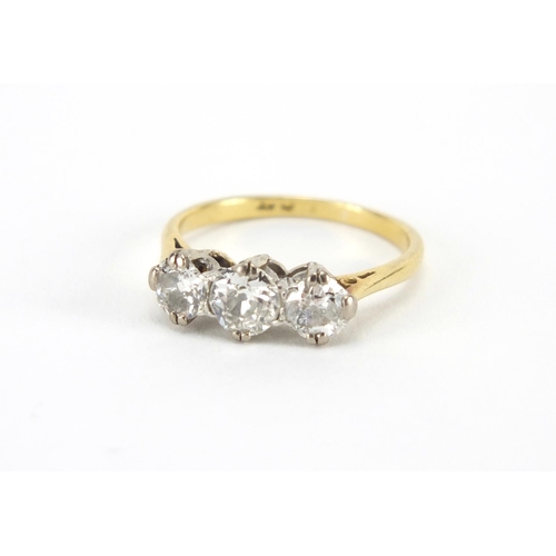 1071 - 18ct gold diamond three stone ring, size L, approximate weight 2.8g