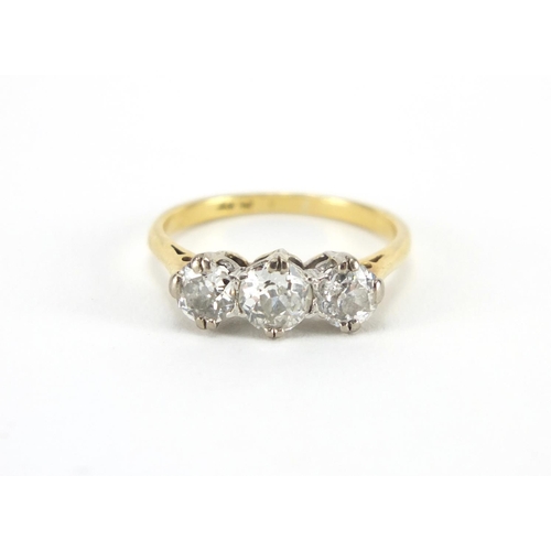 1071 - 18ct gold diamond three stone ring, size L, approximate weight 2.8g