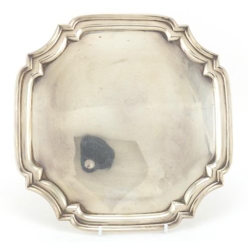 195 - Square silver salver with four scroll feet, by Hamilton & Co, Sheffield 1933, 27cm x 27cm, approxima... 
