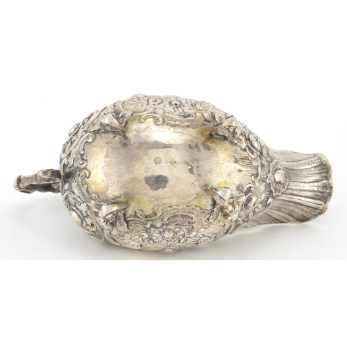 189 - French silver sauce boat, profusely embossed with cherubs and flowers, raised on scroll feet, indist... 