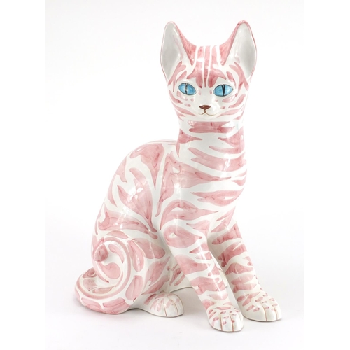 1003 - Large Italian faience glazed pottery cat, hand painted in pink, painted marks and Phillips label to ... 