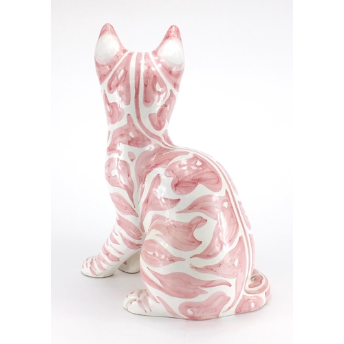 1003 - Large Italian faience glazed pottery cat, hand painted in pink, painted marks and Phillips label to ... 