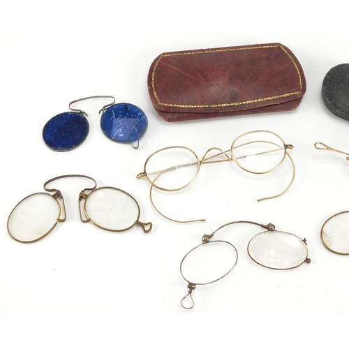 46 - Victorian and later spectacles including four with gold coloured metal mounts