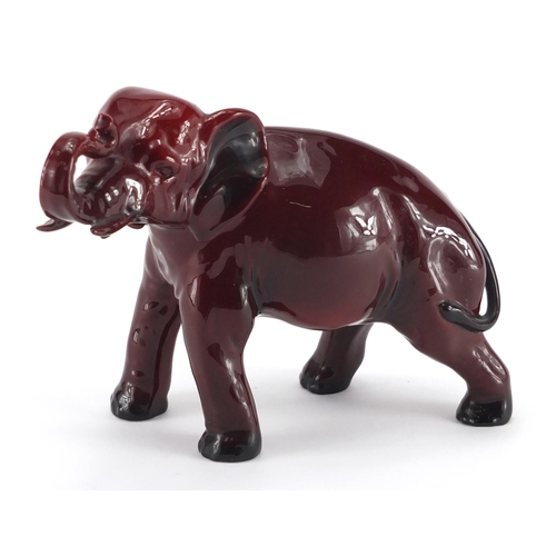 962 - Royal Doulton Flambe elephant, factory marks to the underside, 14cm high x 19cm in length