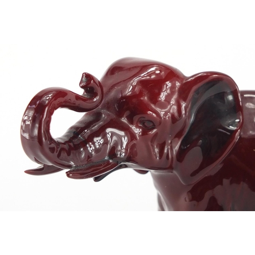 962 - Royal Doulton Flambe elephant, factory marks to the underside, 14cm high x 19cm in length