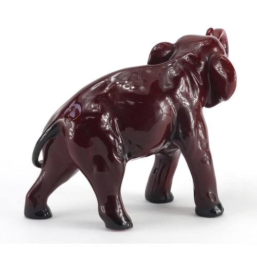 962 - Royal Doulton Flambe elephant, factory marks to the underside, 14cm high x 19cm in length