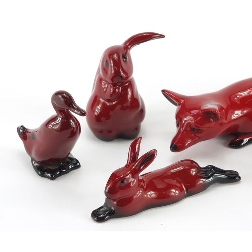 964 - Five Royal Doulton Flambe animals comprising two foxes, hare, rabbit and a duck, factory marks to th... 