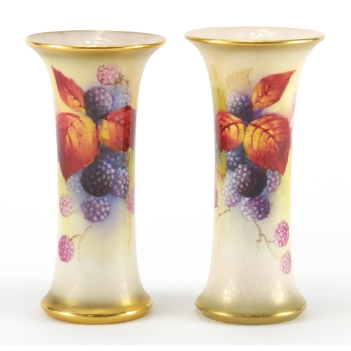 802 - Near pair of Royal Worcester porcelain vases hand painted with berries and flowers by Kitty Blake, f... 