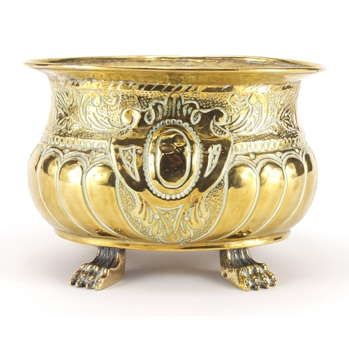 94 - 18th century oval engraved brass planter of small proportions, with tin liner on paw feet, 12.5cm H ... 
