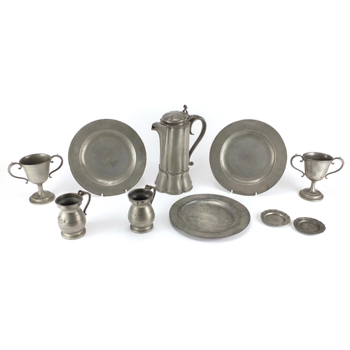 98 - Antique pewter including a lidded jug with hexagonal lobed body and two tankards, various impressed ... 