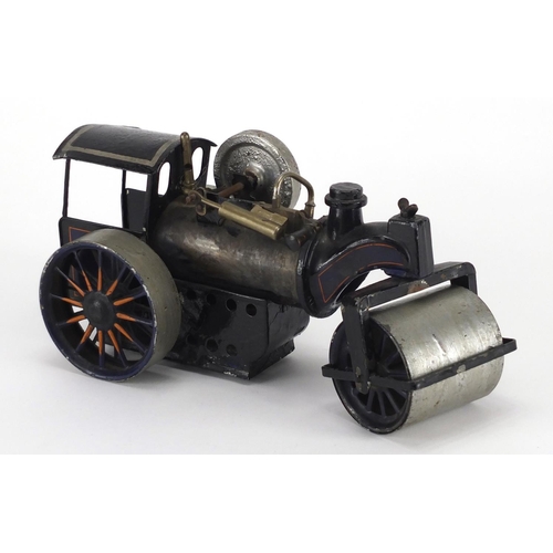 504 - Early 20th century hand painted tin plate steam roller, 23.5cm in length