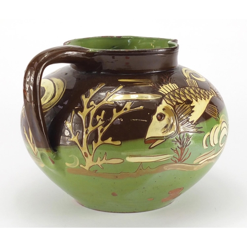 979 - Art Nouveau Barum pottery jug by C H Brannam, hand painted with stylised fish, incised marks and dat... 