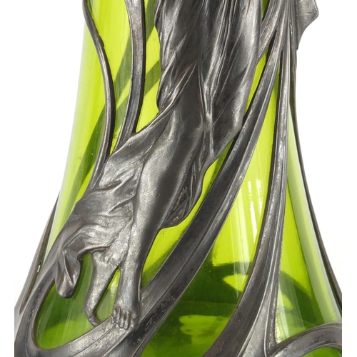 1019 - Art Nouveau pewter and green glass lined ewer by WMF, the pewter body cast with a stylised maiden, i... 