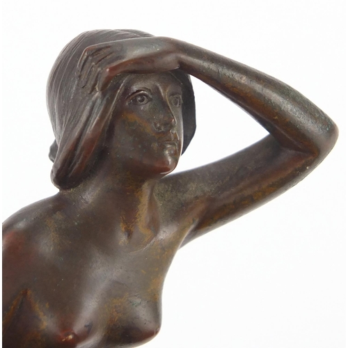 1011 - Art Nouveau patinated bronze desk inkwell with pen tray, modelled with a semi nude maiden, 23cm wide