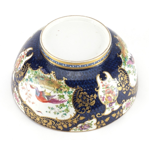 810 - 18th century porcelain punch bowl in the style of Worcester, the exterior hand painted with panels o... 