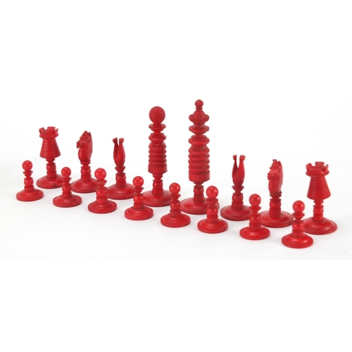 502 - 19th century part stained carved bone chess set, the largest piece 6.5cm high