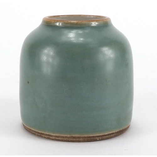 626 - Chinese porcelain green glazed brush washer, blue ring marks to the base, 5.7cm high