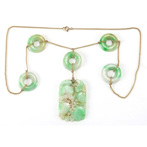 695 - Chinese 9ct gold and green jade jewellery comprising a pendant carved with a mythical creature and f... 