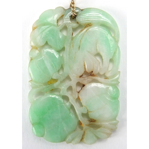 695 - Chinese 9ct gold and green jade jewellery comprising a pendant carved with a mythical creature and f... 