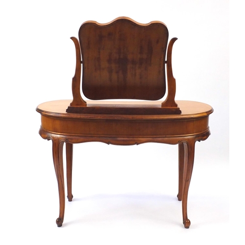 44 - French pitch pine and walnut kidney shaped dressing table, with mirrored back fitted with three draw... 