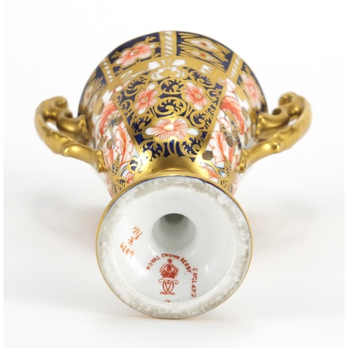 817 - Miniature Royal Crown Derby Imari trophy vase with twin handles, factory marks and numbered 6299 to ... 
