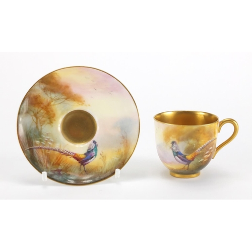 799 - Royal Worcester porcelain cup and saucer hand painted with pheasants by Walter Sedgley, factory mark... 