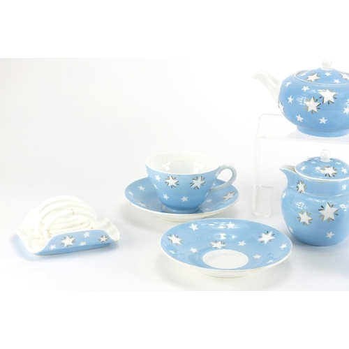 976 - Wedgwood breakfast set, decorated with stars onto a light blue ground, each with factory marks to th... 