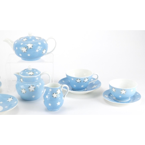 976 - Wedgwood breakfast set, decorated with stars onto a light blue ground, each with factory marks to th... 