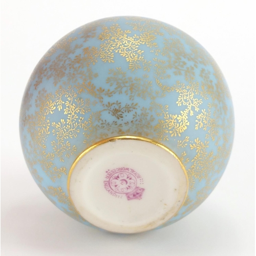 809 - Royal Worcester porcelain potpourri vase and cover, hand gilded in the seaweed pattern onto a powder... 