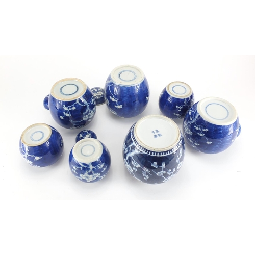 548 - Seven Chinese blue and white porcelain ginger jars four with covers, each hand painted with Prunus f... 